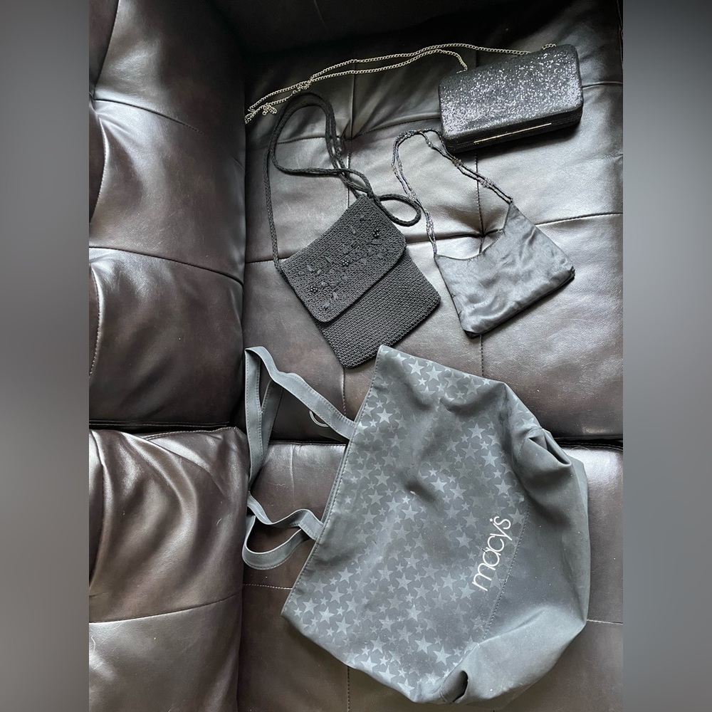 4 little black bags/purses no tags